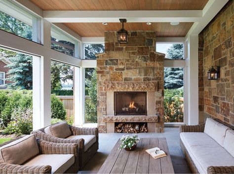 A cozy screen porch with a fireplace offers glimpses of Lake of the Isles. Screened Porch Designs, Porch Fireplace, Building A Porch, Sunroom Designs, Casa Country, Mill Valley, House With Porch, Porch Design, Outdoor Porch