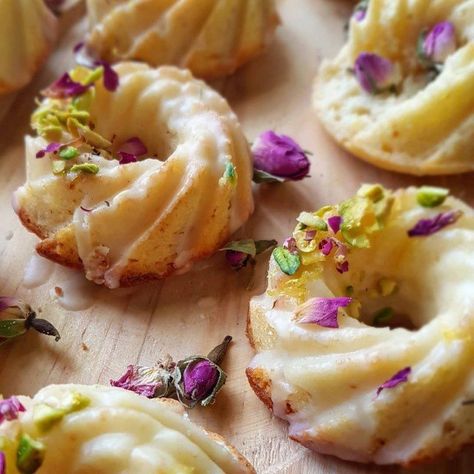 Mini Lemon Bundt Cakes With A Lemon Glaze recipe by Thecooksisterblog Nordic Ware Tea Cake Pan Recipes, Mini Bundt Cake Recipes, Lemon Bundt Cakes, Mini Lemon Bundt Cakes, Sweet Meat Recipe, Lemon Glaze Recipe, Mini Bundt Cakes Recipes, Tea Party Desserts, Doughnuts Recipe