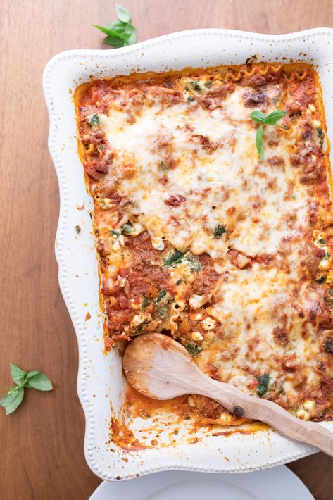 You need this healthy lasagna recipe - friends and strangers have called it "the BEST lasagna recipe EVER"! I’ve been improving this recipe for over 15 years. It’s a much healthier lasagna recipe now! You might know, I’m a former Registered Dietitian, so it’s in my job description to pump everything I can with nutrients. But, I’m also a real person who won’t sacrifice taste for nutrition. This recipe is a nice balance of the two. Healthy Homemade Lasagna, Best Healthy Lasagna Recipe, Health Lasagna Recipe, Healthy High Protein Lasagna, Bison Lasagna Recipe, Lentil Pasta Bake, High Protein Lasagna Recipe, Low Cal Lasagna Recipe, Healthy Lasagna Recipes Clean Eating