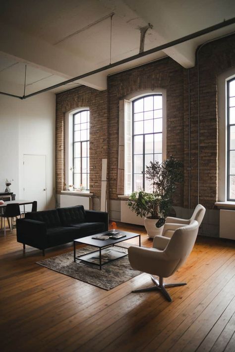 Transform your living space with trendy industrial loft apartment ideas. Think exposed bricks. high ceilings. and large windows. Incorporate metal accents. vintage furniture. and warm lighting. Create a cozy atmosphere while keeping that edgy vibe. Perfect for urban living enthusiasts and design lovers to inspire a unique home makeover! https://fabricerie.com/industrial-loft-apartment Factory Apartment, Urban Loft Apartment Industrial, Open Space Apartment Modern Industrial Loft, Loft Apartment Industrial Exposed Brick Interior Design, Modern Loft Living Room, New York Loft Apartment Industrial Exposed Brick, Modern Industrial Apartment, Apartment Tv, Luxury Apartment Interior Design