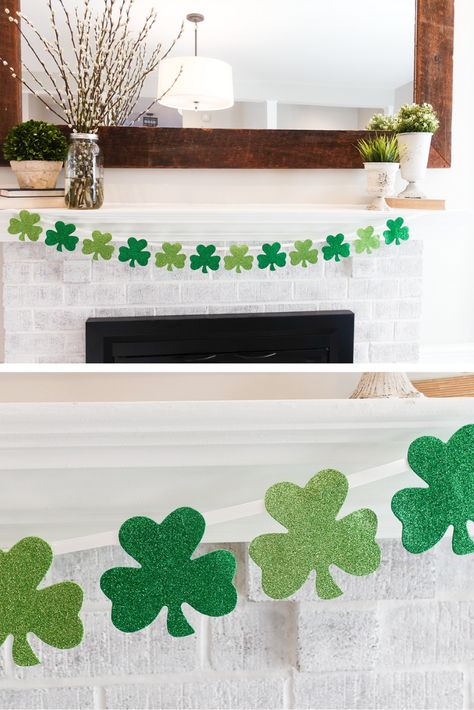 How to create a 10-minute shamrock banner for only $2! Use foam shamrocks from the dollar store, ribbon and a little hot glue to create this festive Saint Patrick's Day banner in just a few minutes. This easy DIY Saint Patrick's Day craft is the perfect addition to your Saint Patty's Day party decor. Shamrock Garland, Fete Saint Patrick, Day Party Decorations, Shamrock Design, San Patrick, St Patrick's Day Decor, Irish Baby, Wedding Shower Decorations, Green Vinyl