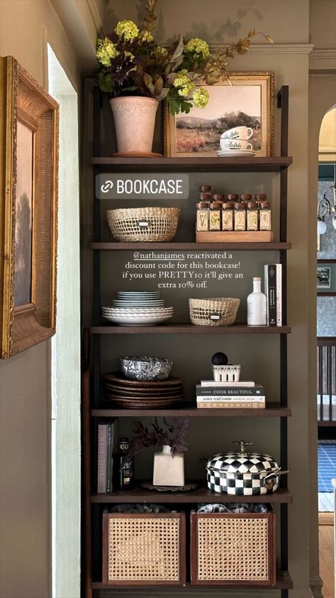 Nathan James Theo Bookcase, Ladder Shelf Decor Kitchen, Prettyinthepines Living Room, Wood Bookshelf Decor, Bookshelf In Kitchen Ideas, Book Shelf In Kitchen, Rustic Bookshelf Styling, Dining Room Bookcase Styling, Kitchen Bookcase Ideas