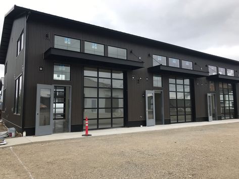 Clutch Industries new project. Commercial Flex space. Modern Industrial Commercial Building, Warehouse Space Design, Black Metal Commercial Building, Warehouse Flex Space, Commercial Garage Design, Modern Steel Building, Commercial Retail Design, Black Warehouse Exterior, Commercial Flex Space