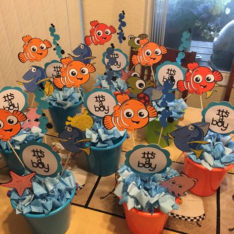 Finding Nemo baby shower centerpieces.  Used cricut Best of Pixar cartridge. Finding Nemo Theme, Nemo Baby Shower, Finding Nemo Baby, Nemo Baby, Finding Nemo Party, Nemo Birthday Party, Finding Nemo Birthday, Nemo Party, Nemo Birthday