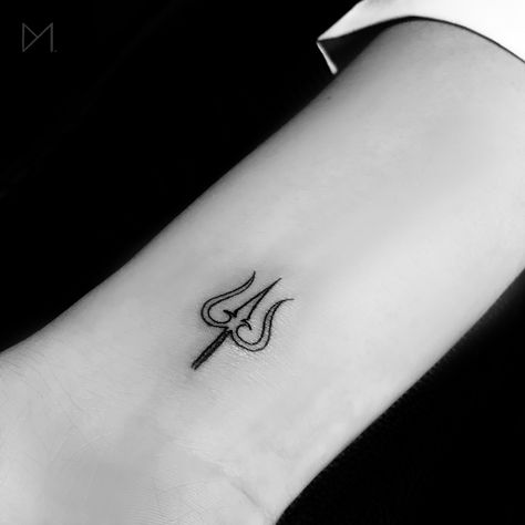 Minimal Trishul / Trident Linework Tattoo Trishul Tattoo Designs, Tattoo Design For Hand, Om Tattoo Design, Tattoo World, Linework Tattoo, Hand Tattoos For Girls, Shiva Tattoo Design, Om Tattoo, Wrist Tattoos For Guys