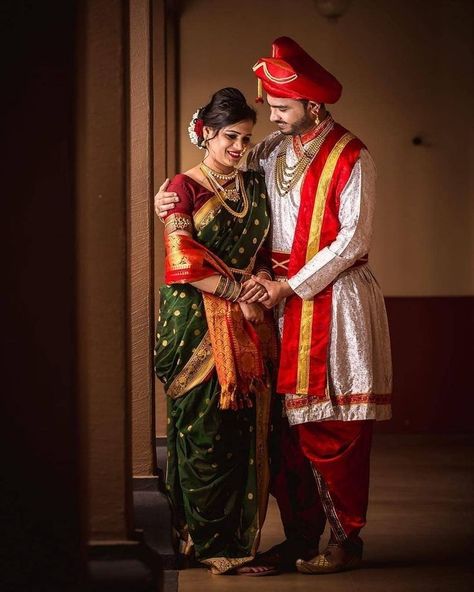 Isn't it amazing that the rituals in every Hindu wedding remains almost same. But the dress keeps on changing according to region and state. In the frame you can see a Maharashtrian couple in their ethnic Maratha dress signifying their Tradition. To know more about it, feel free to contact us Marathi Wedding Photos, Maharashtra Wedding Couple Pose, Marathi Wedding Couple Poses, Marathi Marriage Couple Photography, Marathi Couple Photo, Vaidik Marriage, Maharashtrian Wedding Couple Poses, Marathi Wedding Photography, Marathi Wedding Couple Poses Photography