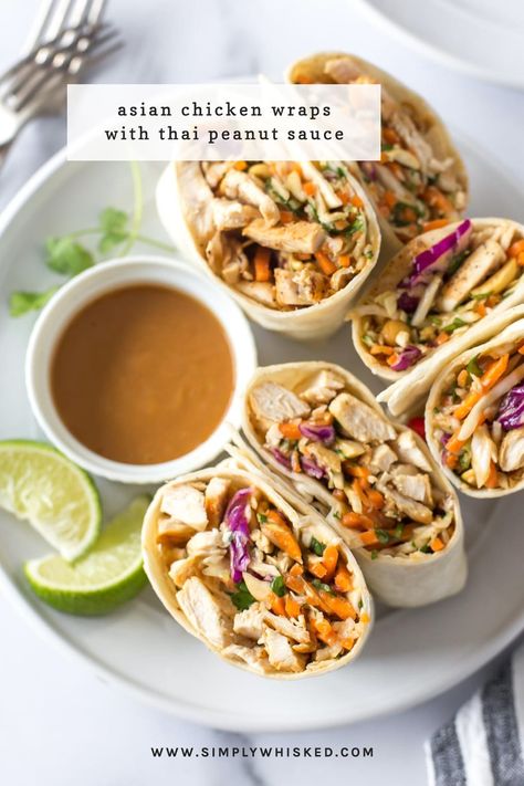 These Asian chicken wraps with peanut sauce are an easy and healthy lunch. Tortillas filled with chicken, crunch coleslaw and peanuts with a spicy, tangy peanut sauce. #chicken #lunch Peanut Sauce Chicken Wraps, Asian Wraps Tortilla, Rice Wraps With Peanut Sauce, Peanut Sauce Chicken Recipes, Teriyaki Chicken Wraps, Peanut Wrap, Asian Cashew Chicken, Peanut Chicken Wraps, Thai Peanut Chicken Wrap