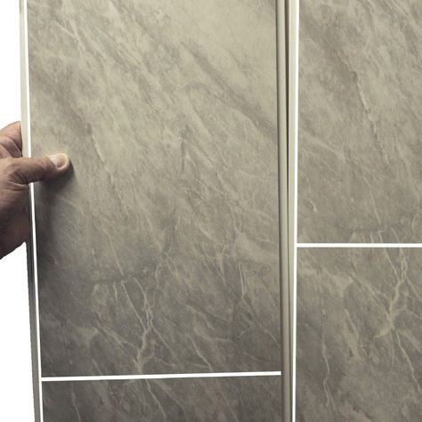 50  Ceiling Panels for Bathrooms Check more at https://www.michelenails.com/50-ceiling-panels-for-bathrooms/ Groutless Tile, Marble Bathroom Wall, Waterproof Bathroom Wall Panels, Basement Wall Panels, Waterproof Bathroom Flooring, Marble Wall Panel, Bathroom Panels, Grey Marble Bathroom, Tile Shower Niche