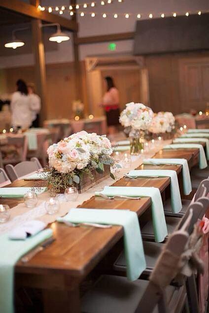 Peach and mint green wedding decor. Farm tables and wood box centerpieces. Mint Green Wedding Dress, Mint Wedding Decor, Rustic Wedding Table Setting, Green Wedding Decor, Mint Green Bridesmaids, Mint Green Wedding, Wood Box Centerpiece, Mint Green Bridesmaid Dresses, Diy Wedding Table