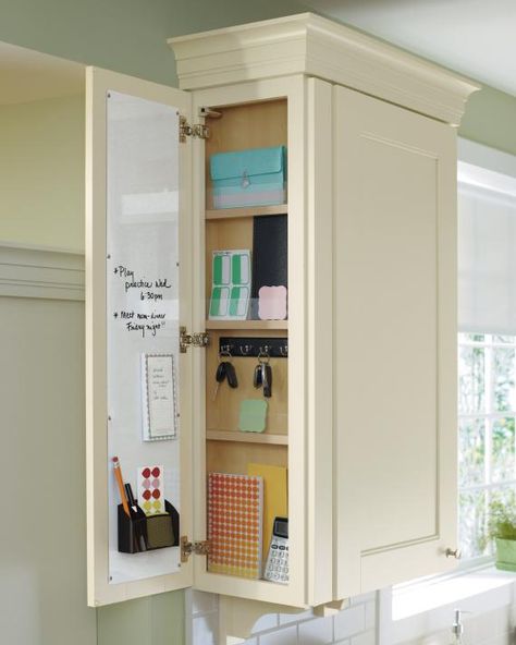 We have this in our kitchen - near the door to the garage. We included an electrical outlet to charge our cell phones. Glassware Shelf, Hidden Shelves, Note Key, Kitchen Storage Ideas, Message Center, Garden Window, Hidden Kitchen, Small Kitchens, Ideas Hogar