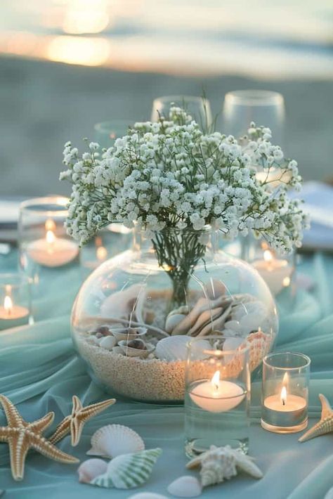 14 Enchanting Baby's Breath Centerpieces For Every Occasion • Ocean Baby Shower Centerpieces, Simple Beach Wedding Ideas Decor, Beach Flower Arrangements, Simple Beach Wedding Ideas, Baby's Breath Centerpieces, Beach Wedding Centerpieces Diy, Beachy Centerpieces, Beach Table Settings, Simple Arrangements