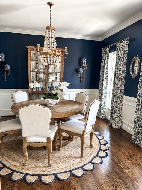 All the details are linked! Navy Blue Farmhouse Dining Room, Blue Dining Room With Chair Rail, Navy Dining Room With White Wainscotting, Navy Blue Dining Rooms, Navy And Gold Dining Room, Navy Accent Wall Dining Room, Navy And White Dining Room, Dining Room Molding Ideas, Best Dining Room Paint Colors