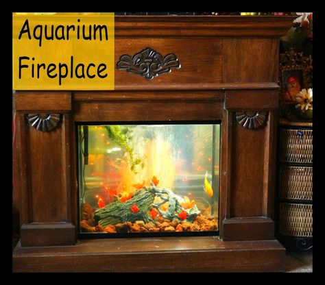 Suzy Homefaker: Aquarium Fireplace Goldfish Breeding, Unique Fish Tanks, Above Fireplace, Cool Fish Tanks, Pond Fish, Old Fireplace, Cool Fish, Aquarium Decorations, Aquarium Fish Tank