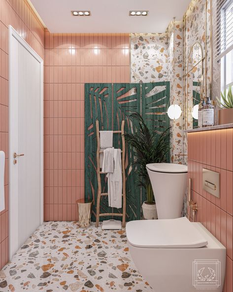 This beautiful space has soft pink tiles and colorful terrazzo flooring, providing a dynamic and friendly environment. The green accent wall offers a refreshing touch, while natural features such as the wooden ladder and plants provide a hint of nature.
#moderninterior  #peachinterior #Peachbathroom #cheerfulbathroom #modernBathroom #creativeBathroomDesign #summerVibes #uniqueBathroom #BathroomRedesign  #ColorfulInteriors #PlayfulDecor #TerrazzoLove Bathroom Peach Color, Pink And Green Toilet, Bathroom With Colorful Tiles, Peach Green Bathroom, Bathroom With Terrazzo Floor, Peach Tiles Bathroom, Peach And Green Interior, Peach And Green Bathroom, Peach Fuzz Interior Design