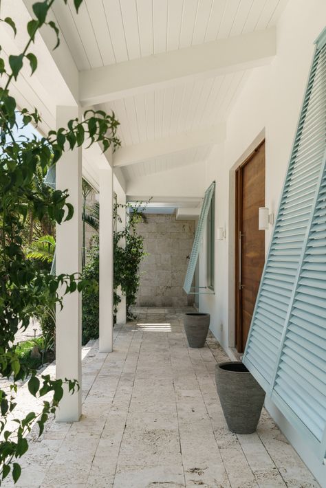 Touzet Studio offers "modern take on island architecture" in the Bahamas Carribean Homes Beach Houses, Blue Bahama Shutters, Bahamas Interior Design, Bahamas Shutters Exterior, Bahamas Architecture, Column Design Exterior, Bahamas Shutters, Lanai Design, Brian Carter