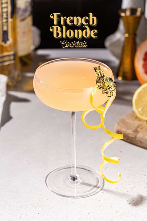 The French Blonde cocktail recipe is so delicious, and reportedly a favorite cocktail of Taylor Swift! Grapefruit juice and Lillet Blanc are the stars of this drink, and they go so well with elderflower liqueur, lemon and gin. This beauty of a cocktail is easy to make at home, but elegant enough for any fancy event! Perfect for a bachelorette party, hen night or even Valentine's Day cocktails! French Blonde Cocktail, French Blonde Cocktail Recipe, Lillet Blanc Cocktails, Gin And Grapefruit, Elderflower Drink, Lemon Peel Garnish, French Blonde, Popular Mixed Drinks, Grapefruit Drink