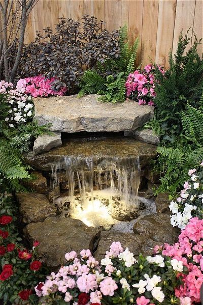 14 Awesome Small Pond Waterfall Ideas! | OutsideModern Small Garden Waterfalls, Pond Decor, Taman Air, Fountain Ideas, Air Mancur, Fiberglass Pool, Outdoor Water Features, Garden Waterfall, Pond Waterfall