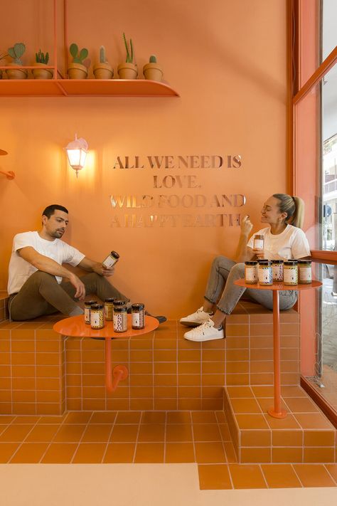 Bright Cafe Aesthetic, Orange Coffee Shop, Terracotta Interior, Orange Restaurant, Orange Cafe, Orange Tile, Colorful Restaurant, Monochromatic Interior, Orange Bar