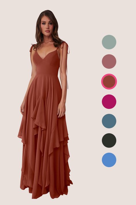 This flowy dress features double adjustable spaghetti straps with a bow tie at the shoulders, pockets, and a ruffled tier handkerchief cut skirt. Tiered Ruffle Bridesmaid Dress, Maid Of Honor Dress Fall, Auburn Bridesmaid Dresses, Fall Bridesmaid Dresses Rustic, Earthy Bridesmaid Dresses, Bridesmaid Dress Burnt Orange, Different Style Bridesmaid Dresses, Fall Bridesmaids Dresses, Beachy Bridesmaid Dresses