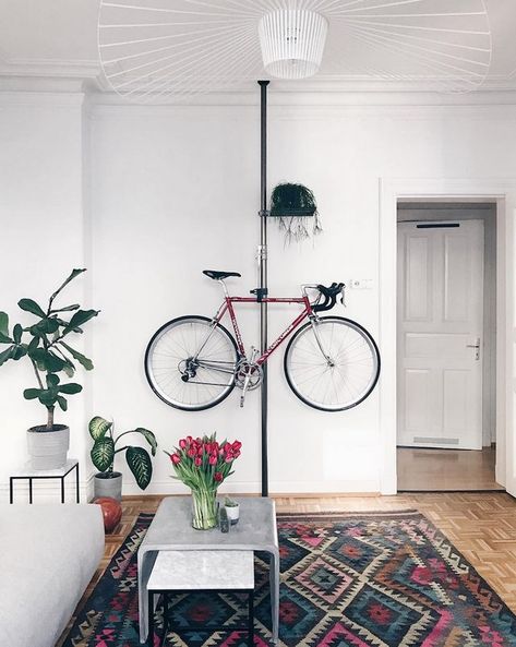 Teal Steals the Show in This Hamburg Apartment Bike Storage Small Space, Bike Storage Design, Bike Storage Room, Bike Storage Apartment, Indoor Bike Storage, Storage Apartment, Bike Storage Solutions, Apartment Storage, Kitchen Storage Space