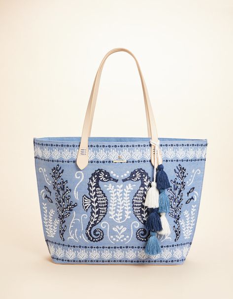 The best party is a beach party and our Fiesta Tote is always ready to come along! Decorated with an embroidered seahorse on a cotton and jute blend, this tote features a fun, tiered tassel fob and a faux leather bottom base to keep it dry. The custom, crosshatch patterned cotton interior features two slip pockets and one hanging zipper pocket. Cute Beach Bags, Embroidered Seahorse, Beach Bags Totes, Summer Totes, Spartina 449, Best Party, Beach Shop, Printed Handbags, Embroidered Bag