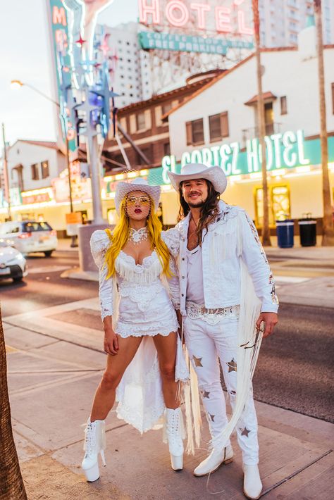 Not Another Wedding: A No Fucks Given Las Vegas Vow Renewal · Rock n Roll Bride Vegas Wedding Dress With Boots, Vegas Themed Costumes, Tacky Wedding Dress, Vegas Wedding Mens Outfit, Vegas Party Outfit Ideas, Vegas Costume Party, Mens Vegas Wedding Attire, Vegas Dress Up Theme, Las Vegas Cowgirl Outfit