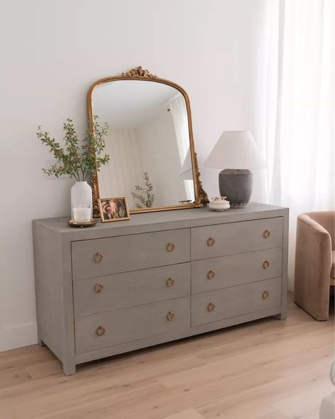 Vintage Gold Mirror Bedroom, White Dresser Gold Mirror, Vintage Mirror Over Dresser, How To Decorate Dresser With Mirror, Grey And Gold Furniture, Brass Bedroom Decor, Gold Mirror Dresser, Arch Mirror On Dresser, Gold Mirror On Dresser