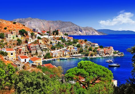 Matt Barrett's Greek Islands Guide: The Dodekanese Cheap Holidays, Greece Landscape, Greek Islands Vacation, Neoclassical House, Rhodes Island, Colorful Houses, Greece Travel Guide, Mediterranean Cuisine, Jules Verne