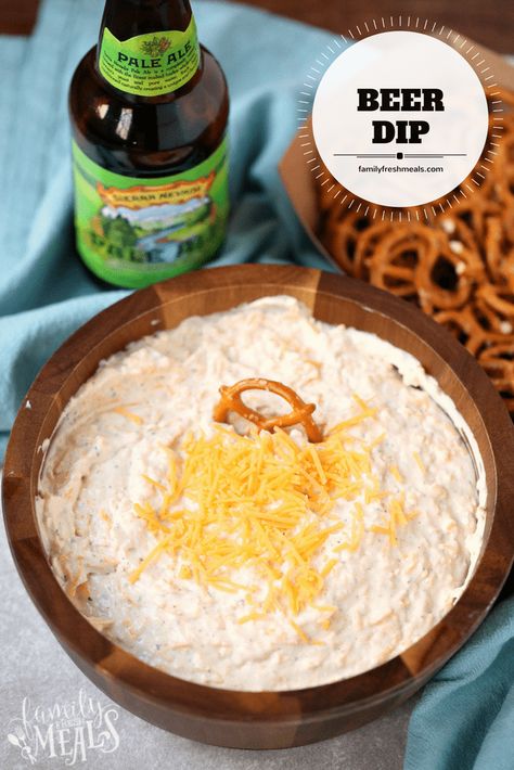 Beer Dip served in a bowl with pretzels and a bottle of beer Beer Dip Recipe, Peach Crumble Bars, Beer Dip, Beer Cheese Dip, Peach Crumble, Fresh Meals, Family Fresh Meals, Crumble Bars, Peach Desserts