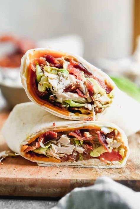 Turkey Club Wraps filled with turkey (or rotisserie chicken), bacon, lettuce, tomato, cheese and avocado. This 15-minute meal makes a great lunch or quick dinner and is nutrient packed to keep you full. Farmer Meals, Teriyaki Bowls, Club Wrap, Slow Cooker Shredded Beef, Turkey Wrap, Chicken Bacon Ranch Wrap, Tomato Cheese, Turkey Club, Turkey Wraps