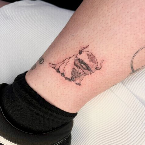 The cutest Appa tattoo with @pyperraewilliams today 🫶 • • • • • • #tattooideas #tattoodesigns #arttattoo #flowertattoo #tattoogirl #tattoo #manga #tattoopopculture #popculture #weeb #popculturetattoos #finelinetattoo #tattoo #tattoos #feminietattoos #fineline #animefineline #girlyanime #abstracttattoo #classicalart #newcastletattoos #finelinetattoos #moderntattoos #tattooartists #australiantattoos #delicatetattoo #linetattoos #australiantattoosartist Momo Avatar Tattoo, Appa Avatar Tattoo, Feminie Tattoos, Appa Tattoo, Avatar Tattoo, Tattoos Inspiration, Delicate Tattoo, Modern Tattoos, Abstract Tattoo