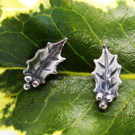 Silver Holly Earrings, Holly Leaf Earrings, Sterling Silver Christmas Jewelry, Christmas Earrings, Holly Studs, Christmas Gifts Have a 'Holly Jolly Christmas' all year round with our Silver Holly Leaf Stud Earrings. Handcrafted in 925 Sterling Silver, each earring is highly detailed with 3 tiny berries, etching on the leaves and finished in the famous spikey leaf shape. Complete with a solid silver stem and butterfly back, they are perfect for all ages! A great gift to give in the festive season Rustic Gift Wrapping, Earrings Christmas, Pierced Jewelry, Jewelry Christmas, Silver Christmas, Holly Leaf, Christmas Earrings, Christmas Jewelry, Leaf Earrings