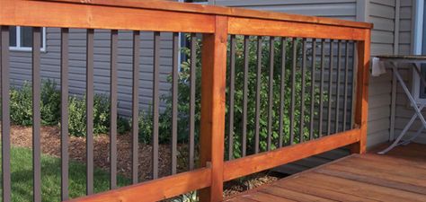 Face Mount "Iron" Balusters - nice upgrade for existing spindles. Wood Deck Railing, Front Porch Railings, Deck Balusters, Deck Remodel, Deck Railing Design, Patio Deck Designs, Wooden Deck, Aluminum Decking, Deck Designs Backyard