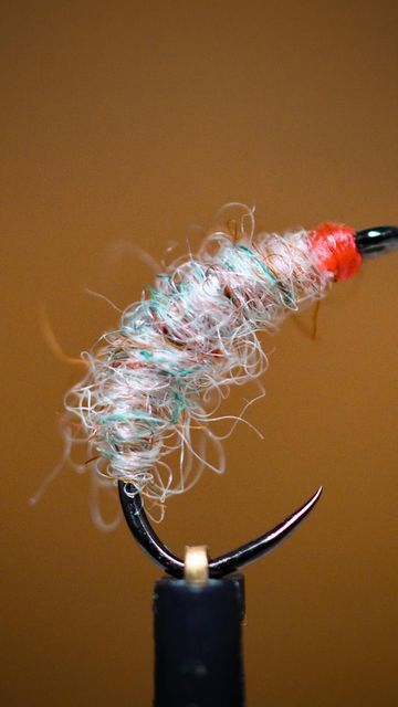 Fly Life Utah on Instagram: "Utah Killer Bug — a tried and true pattern. Save this video and tie one for yourself. Recipe: Hook: Scud size 14 (pick your brand) Thread: @semperfli_flytying Fluoro Brite Pale Pink #2 3/0 240D Weight: @harelinedubbin lead free wire .015 Body: Jamieson’s Shetland Spindrift Oyster 290 UV Resin: @solarezflytying Bone Dry Clear @renomedusa The best scissors I have ever used. @stonfo_flyfishing Transformer Vise. #catchandrelease #findyourwater #flyfishing #flyfishin Bug Pattern, Fly Fishing Photography, Caddis Flies, Best Scissors, Trout Fishing, Tried And True, Fly Tying, Uv Resin, Get Outside