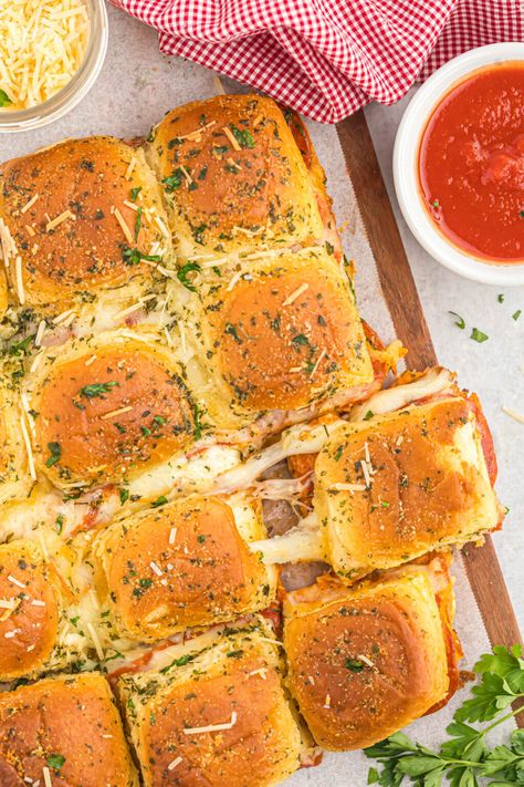 piece of pizza slider with stringy cheese Pepperoni Sliders, Pepperoni Pizza Sliders, Pizza Sliders, Pizza Slider, Sweet Dinner Rolls, Slider Rolls, Piece Of Pizza, Bagel Bites, Cheese Tomato