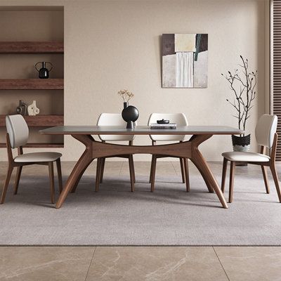 Our Modern Minimalist Solid Wood Rock-Plate Table reimagines the dining space with its artistic design and unmatched durability. A comfortable and stylish addition to any dining room. Orren Ellis Size: 29.5"H x 55.1"L x 31.4"W, Table Top Color: Gray | Orren Ellis Rayquann Rectangular Dining Set brownWood in Gray | 29.5"H x 55.1"L x 31.4"W | Wayfair Modern Midcentury Dining Room, Modern Dining Table Chairs, Coffee To Dining Table, Wayfair Dining Table Set, Minimalist Dining Area, Dining Table Minimalist, Modern Minimalist Dining Room, Midcentury Dining Room, Dining Table Grey