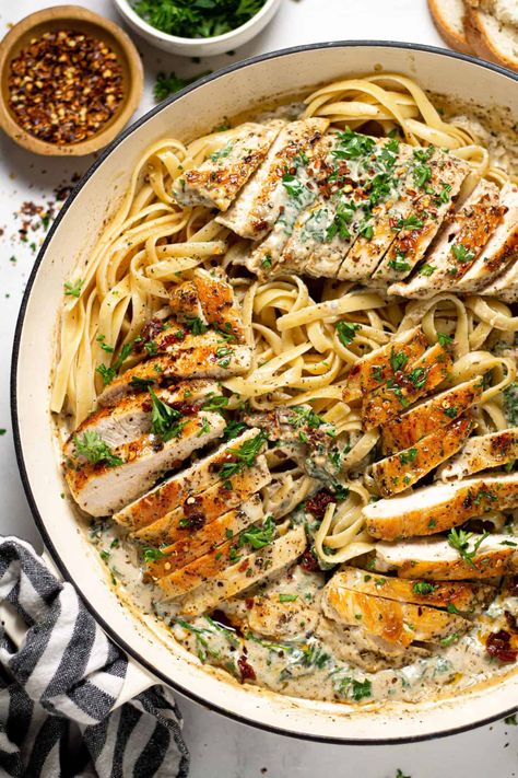 Creamy Tuscan Chicken Alfredo | This creamy Tuscan chicken is the picture of perfection! Sun dried tomato and Parmesan cream sauce along with juicy herb seasoned chicken breasts, nestled into a bed of al dente fettuccine noodles. Blackened Chicken Alfredo, Garlic Mashed Potatoes Easy, Creamy Tuscan Chicken, Recipe Inspirations, Chicken And Pasta, Italian Meals, Tuscan Chicken Pasta, Bday Dinner, Fettuccine Noodles