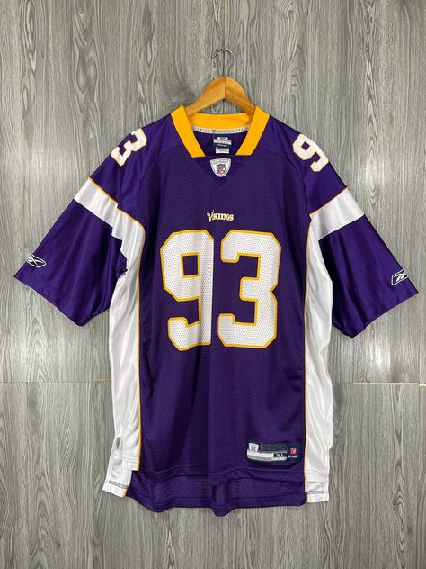 Vintage 1990s Minnesota VIKINGS Nfl Jersey Xlarge Nfl American Football Rugby Team Sportswear Kevin Williams Fan Apparel Jersey Size XL in great used ... Jersey Shirt Outfit, Nfl Uniforms, Clothing Manufacturing, American Football Shirt, Football Jersey Outfit, American Football Jersey, Nfl T Shirts, Rugby Team, Nfl Outfits