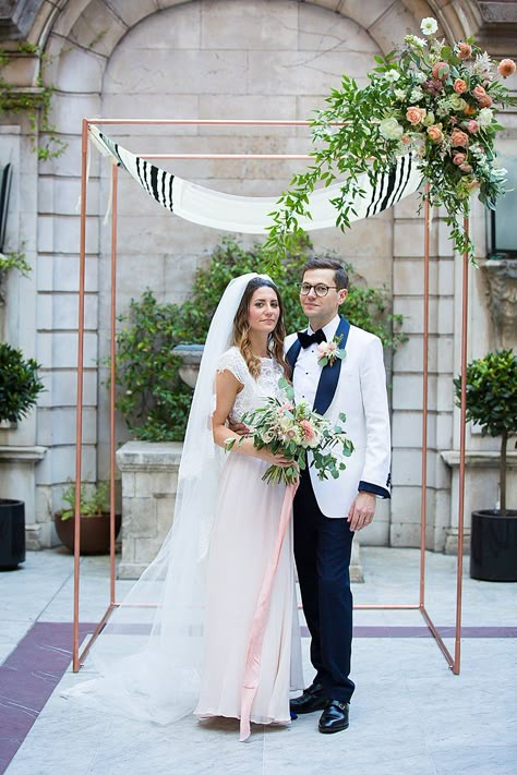 A Leanne Marshall Bride for a City Chic Jewish Wedding with a Rose Gold Chuppah at Dartmouth House, Mayfair, London, UK Chuppah With Tallit, Simple Chuppah Ideas, Chuppah Beach, Chuppah Simple, Copper Chuppah, Chuppah Inspiration, Simple Chuppah, Modern Chuppah, Altar Ideas Wedding