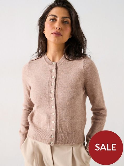 River Island Neat Button Knitted Cardigan Size & Fit True to size - order your usual size Regular fit Available in sizes XS - L (XS:UK 6, S:UK 8-10, M:UK 12-14, L:UK 16-18) Details Neat Button Cardigan - Light Brown by River Island Brown Long sleeves Crew neck Button through