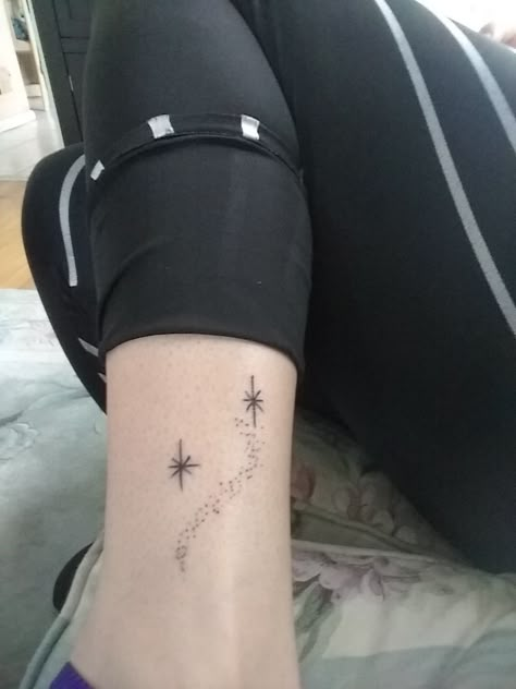 Second star to the right , pixie dust, ankle/leg, Peter Pan Pixie Dust Tattoo Ideas, Tattoo Second Star To The Right, The Second Star To The Right Tattoo, Subtle Peter Pan Tattoo, Neverland Stars Tattoo, Pixie Dust Tattoo Stars, Peter Pan Compass Tattoo, Peter Pan Tattoo Star, Fairy Dust Tattoo Stars