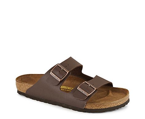 Birkenstock Arizona Men s Sandal A true pioneer of laid-back comfort, the Arizona mens Sandal from Birkenstock features the original footbed with pronounced arch support, a roomy toe box, and a deep heel cup. Two soft straps with buckles provide an adjustable fit. Birkenstock uses natural & renewable materials with a focus on environmentally friendly operations. Dual buckle closure sSuede insoleCork-latex footbedEVA outsole Mens Birkenstocks, Brown Birkenstock, Men Birkenstock, Birkenstock Men, Birkenstock Brown, Rack Room, Rack Room Shoes, Footbed Sandals, Birkenstock Sandals