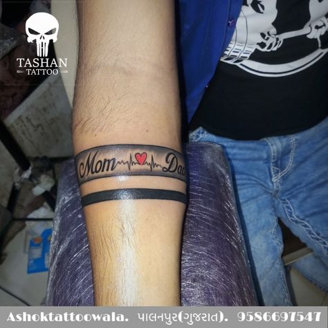 Hand band tattoo with mom dad logo ||Tashantattoo||ashoktattoowala||Gujarat||Banas Kantha||palanpur|| Tattoo Mom Dad, Hand Band Tattoo, Love Music Tattoo, Mum And Dad Tattoos, Tattoo Mom, Mom Dad Tattoo Designs, Japanese Flower Tattoo, Hand Band, Band Tattoo Designs