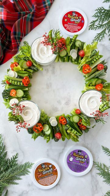 Berry & The Boards on Instagram: "How to build a crudités wreath featuring @heluvagooddips 🎄🥕🥒 Entertaining for the holidays can sometimes be stressful, but with the right prep and Heluva Good! Dips, you can create the perfect healthy crudités board! Pro Tip: Use a round board and line the edges with your veggies to create a crudités wreath for the holidays! Here’s what I used: Start with your Heluva Good! dips to set the foundation of your crudités board. I used: • French Onion • Butter Crudite Wreath, Christmas Crudite, Veggie Wreath, Good Dips, Veggie Christmas, Christmas Catering, Onion Butter, Crudite Platter, Buttermilk Ranch