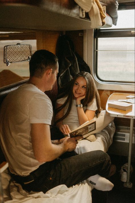 couple in love reading a book on the train.  boy reading a book to a girl Rv Photoshoot, Camper Photoshoot, Camping Ideas For Couples, Trip Couple, Camping Photoshoot, Romantic Camping, Boy Reading, Arizona Engagement, Rv Trip