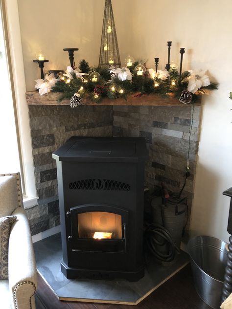 Pellet Stove Christmas Decor, Pellet Stove Surround Corner, Living Room Pellet Stove, Mantle Over Pellet Stove, Wall Behind Pellet Stove Ideas, Electric Wood Stove Ideas, Pellet Stove Ideas Living Rooms With Tv, Tv Above Pellet Stove, Corner Pellet Stove Mantle