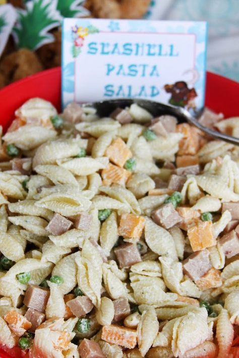 Mermaid Pasta Salad, Seashell Pasta Salad Recipes, Sea Shell Pasta Recipes, Vegetarian Luau Party Food, She’ll Pasta Salad, Sea Shell Pasta Salad, Moana Themed Desserts, Moana Dinner Ideas, Stitch Food For Party