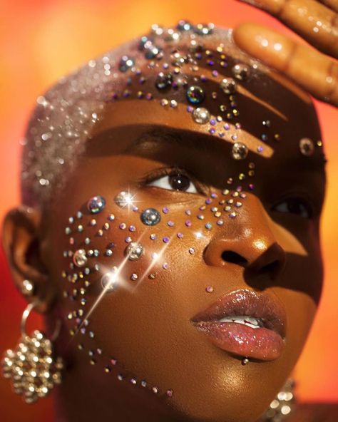 Radr Africa (@radrafrica) • Instagram photos and videos Pearl Rhinestone Makeup, Diamonte Makeup, Pearl Makeup Looks Black Women, Gems Photoshoot, Gold Goddess Makeup, Under The Sea Makeup, Rhinestones On Face, Stone Makeup, Pearl Mask