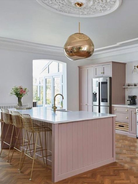 Kitchen décor ideas: pink cabinets Pale Pink Kitchen, White Stone Countertops, Shiplap Cabinets, Kitchen With Shiplap, White Stone Backsplash, Gold Pendant Lamp, Pink Cabinets, Tall Stools, Stone Backsplash