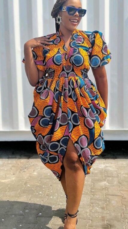 Short Ankara gown styles for curvy ladies is exceptional for their ability to blend tradition with modern trends seamlessly. Traditional African motifs and vibrant prints gracefully com Casual Ankara Gowns For Women, Short Ankara Styles, African Shift Dress, Short Ankara Gown, Serwaa Amihere, African Wear Designs, African Motifs, Short Ankara Dresses, Ankara Short Gown Styles